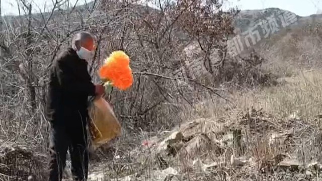 七旬老人守无名烈士墓23年