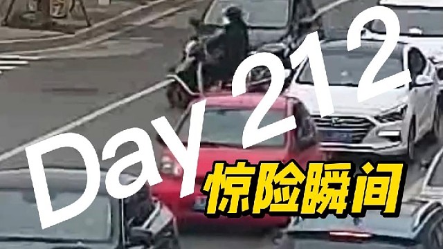 骑电动车图方便横穿马路，辛“盔”有它