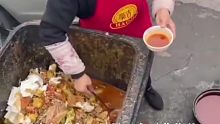 饭店员工从垃圾桶捞废油，被网友拍下质疑该店制作地沟油，负责人回应：员工个人行为，与饭店无关