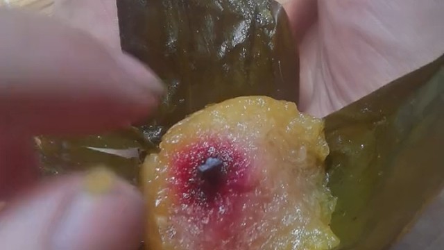 问一下为什么粽子中间插这这跟棍子