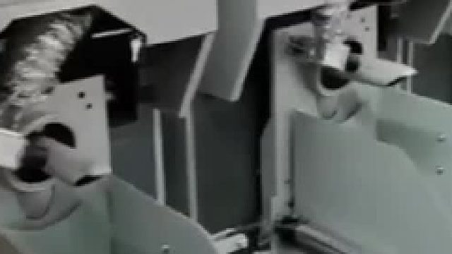 自动夹盖包装机100kg脱氧剂包装机