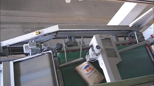 重力式包装机 25kg塑料板包装机