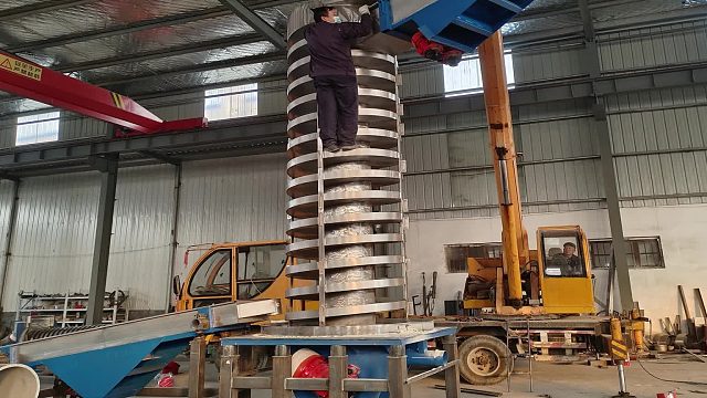 聚丙拉丝填充母料风冷降温盘式振动提升机