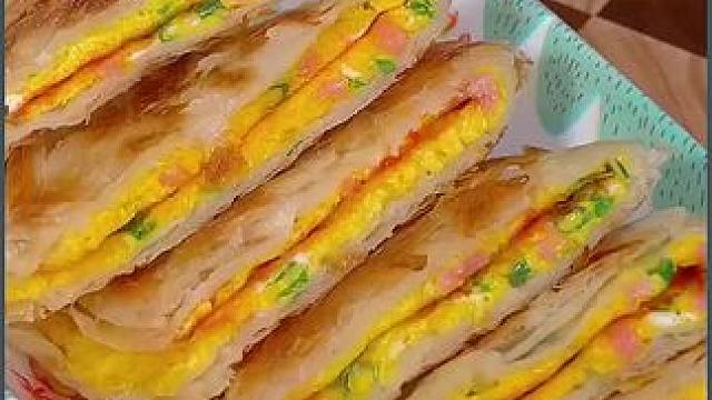 開學想吃又快又有營養(yǎng)的早餐，你就試試這個火腿雞蛋手抓餅，外酥里嫩，幾分鐘就能搞定#好吃到停不下來 #