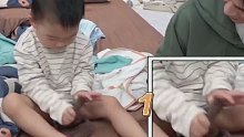 本来都穿好了，还脱了再穿，太可爱了宝宝