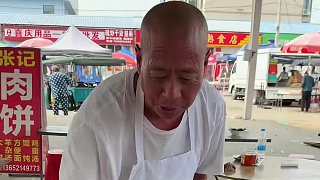 天津大集上現(xiàn)做的肉餅，一張六斤重皮薄餡大