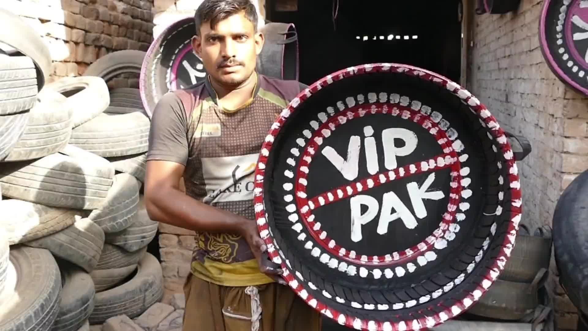 巴铁维修用废旧轮胎制作出一个精美的水盆全过程。