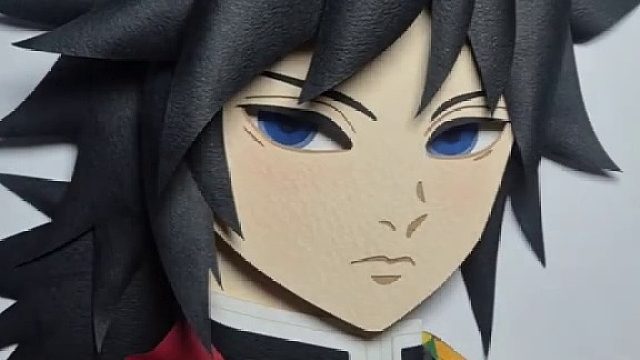 用纸制作《鬼灭之刃》水柱·富冈义勇用彩色纸张制作了 《鬼灭之刃》 的水柱，富冈义勇。视频记录了从头发分层到五官组装的完整制作过程。每一层纸张的叠加，都是为了