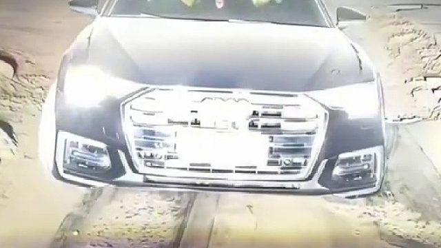 视频车马上要出窄路 不料前方来了一辆奥迪。