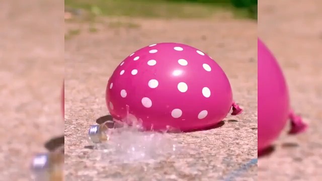 当气球被戳破的那一刻,整个世界静止了!