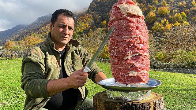 a huge doner kebab made of homemade and fresh meat