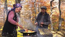 Cooking Whole Sturgeon Fish on Charcoal in the For