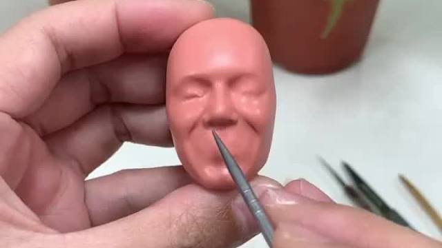 黝黑的皮肤，纯真的笑脸，大家猜我捏的是谁