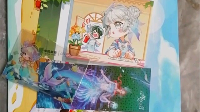 【拆周边】是以闪亮之名和邮政联名的明信片和卡，嘿嘿，终于来啦，好可爱