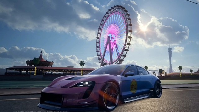 摩天轮下的保时捷