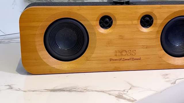 为我们的生活增添了一抹雅致的色彩，DOSS原木居家蓝牙音箱