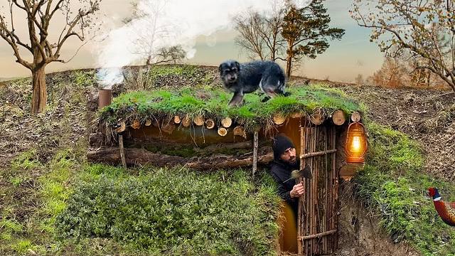 在山野中挖掘的地下庇护所，和我的狗蜗居在里面，烤着柴火还有一点点温暖