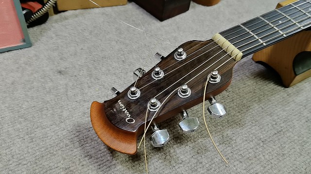 ovation木吉他的后盖怎么打开