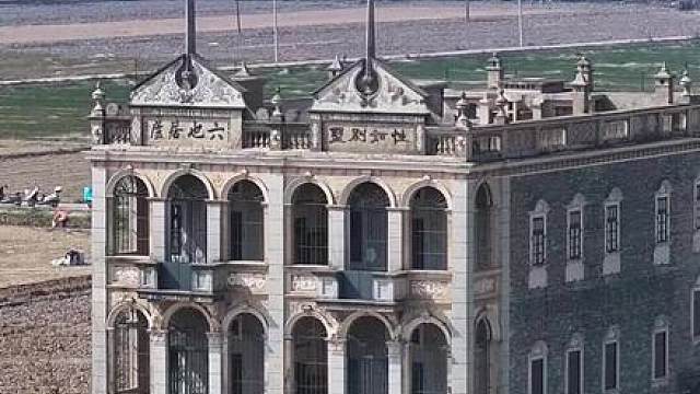 这是旅美华侨谭华强于1930年回国后倾尽所有建造的建筑