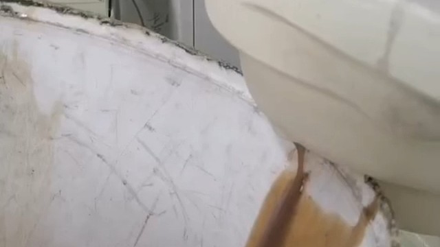 川崎机械手码包后清理油脂