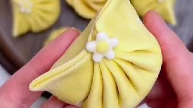 #实用小技巧 #生活小妙招 #实用小秒招 #饺子的花式包法 #饺子这样包好看又好吃