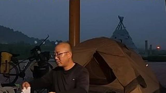 夏季骑行黑龙江，林区气候闷热遇连续大坡，晚上塔河县城公园过夜#骑行vlog #让骑行成为一种生活 #