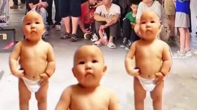 三胞胎广场跳舞引众人围观，真是跳得太棒了