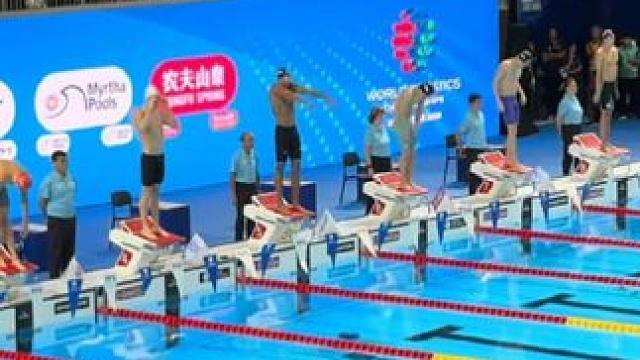 男子200米混合泳决赛，现场的氛围在呐喊助威中燃爆了，新科世界纪录保持者莱昂#马尔尚 以1:53.6